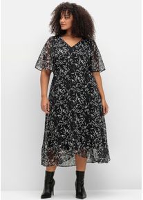sheego Witt Damen Chiffonkleid mit Blumendruck und Volant am Saum, schwarz-weiß gemustert, Größe 46, 100% Polyester